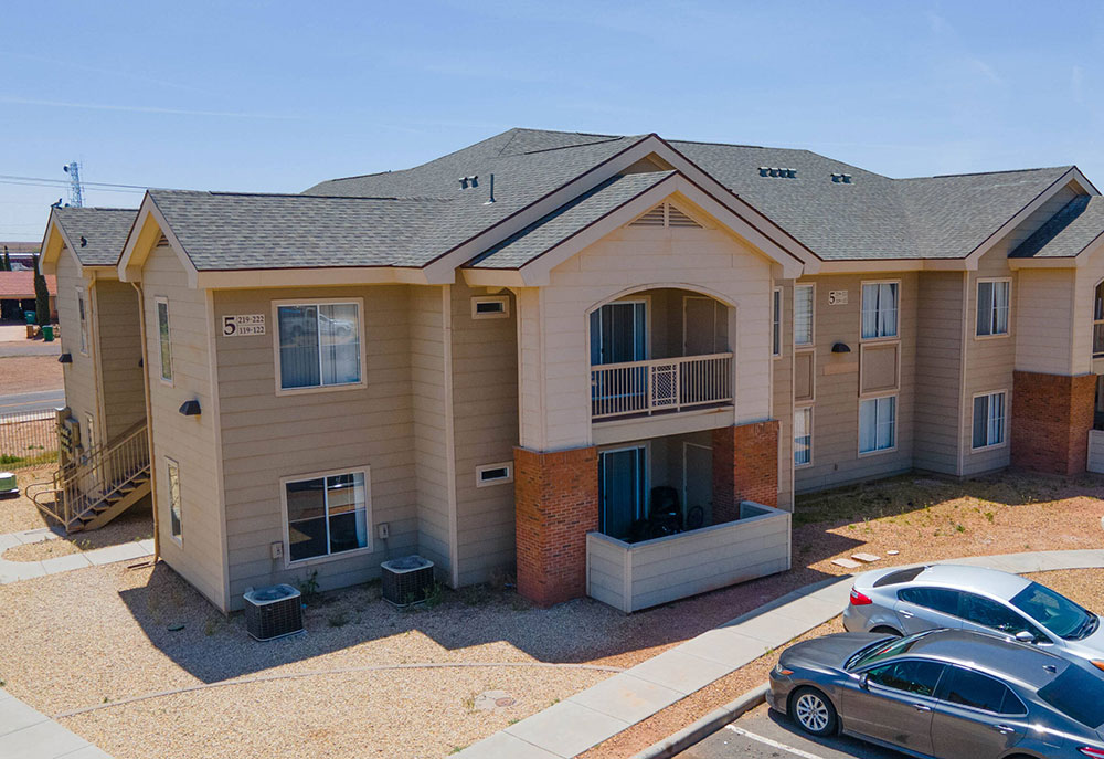 This image displays the exterior of Winslow Crossings Apartments.