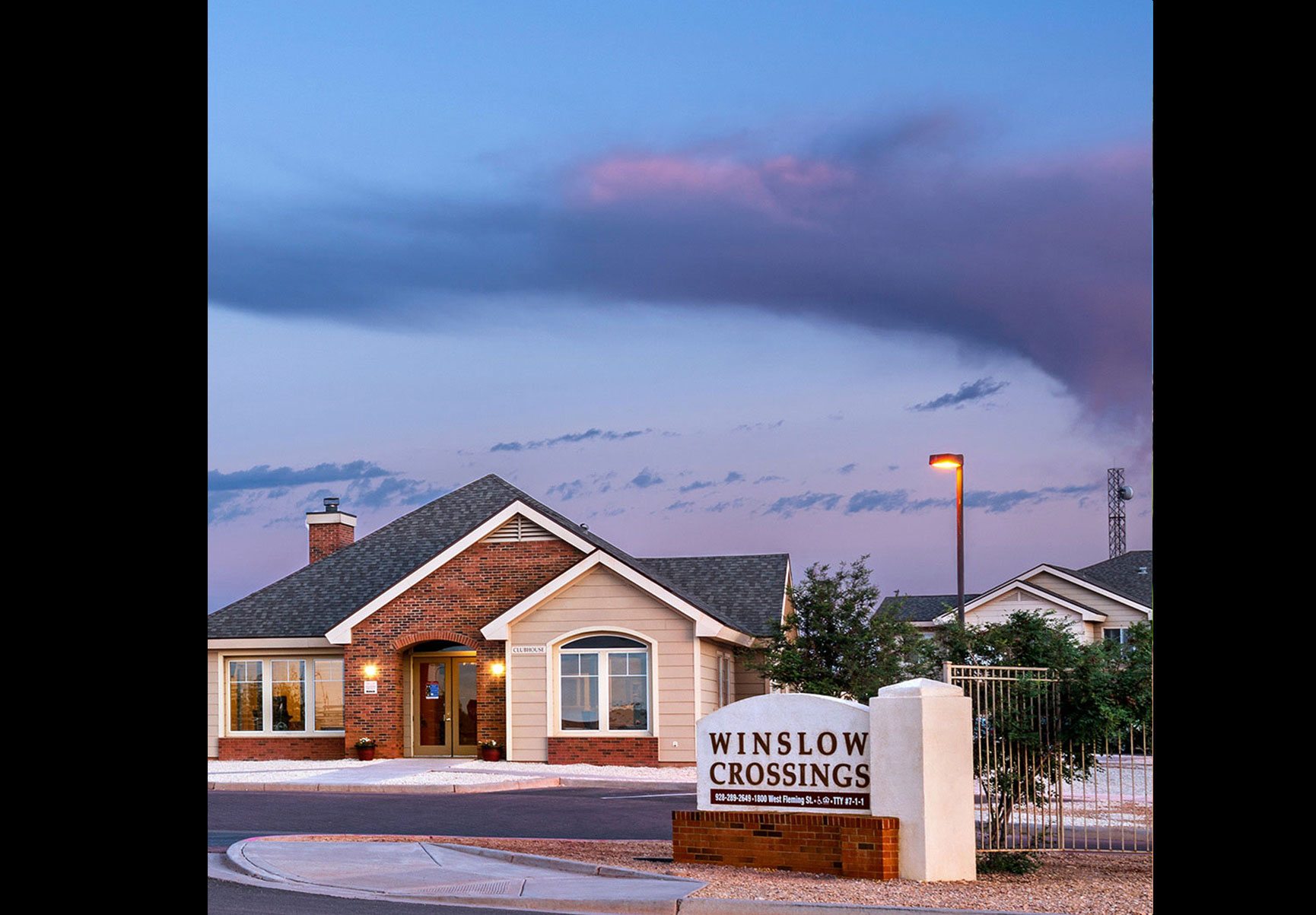 This image displays entrance marker photo of Winslow Crossings Apartments